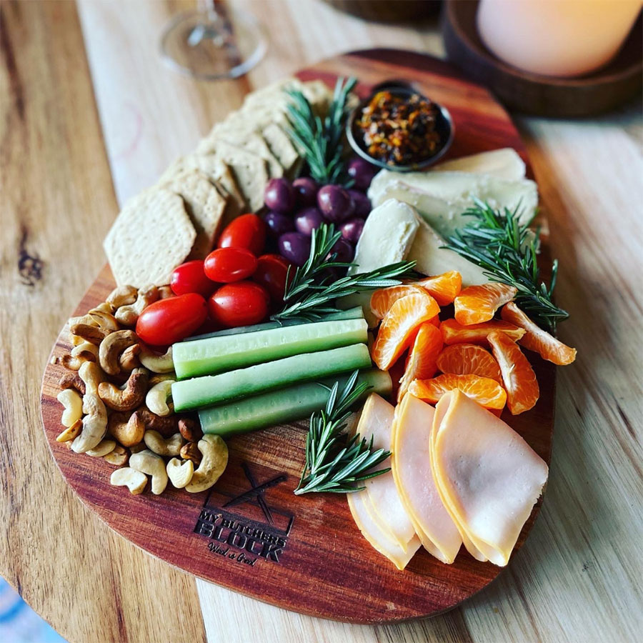 my butchers block egg shaped charcuterie board styled